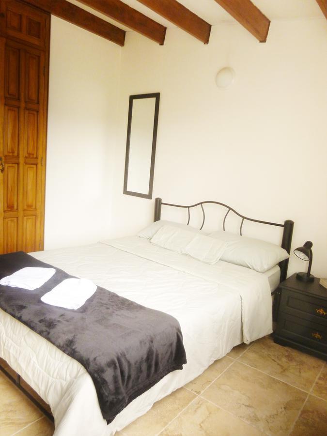 Hostal Cafe Casa Caturro มานิซาเลส ภายนอก รูปภาพ
